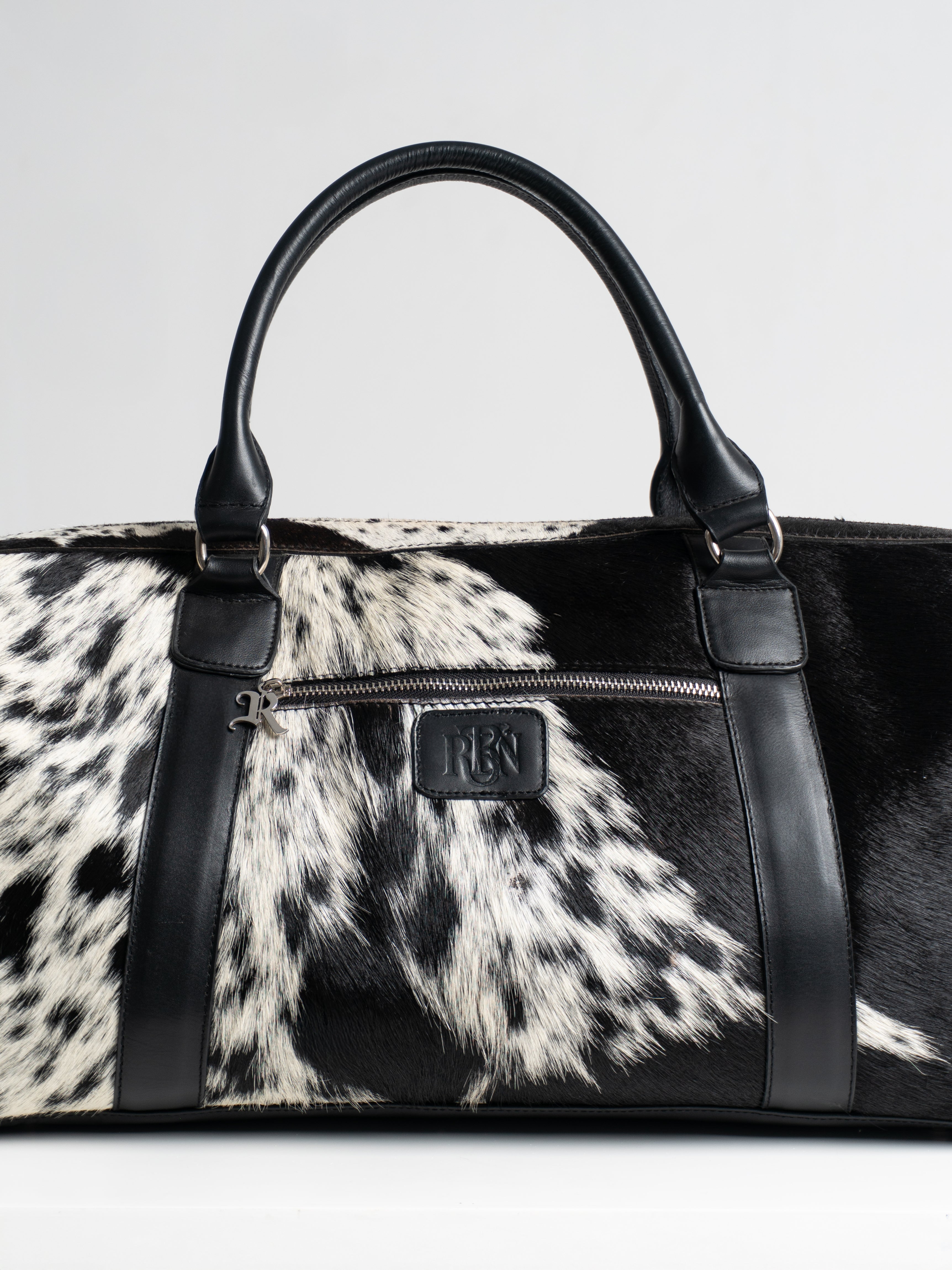 THE HIDE DUFFLE BAG - COWHIDE